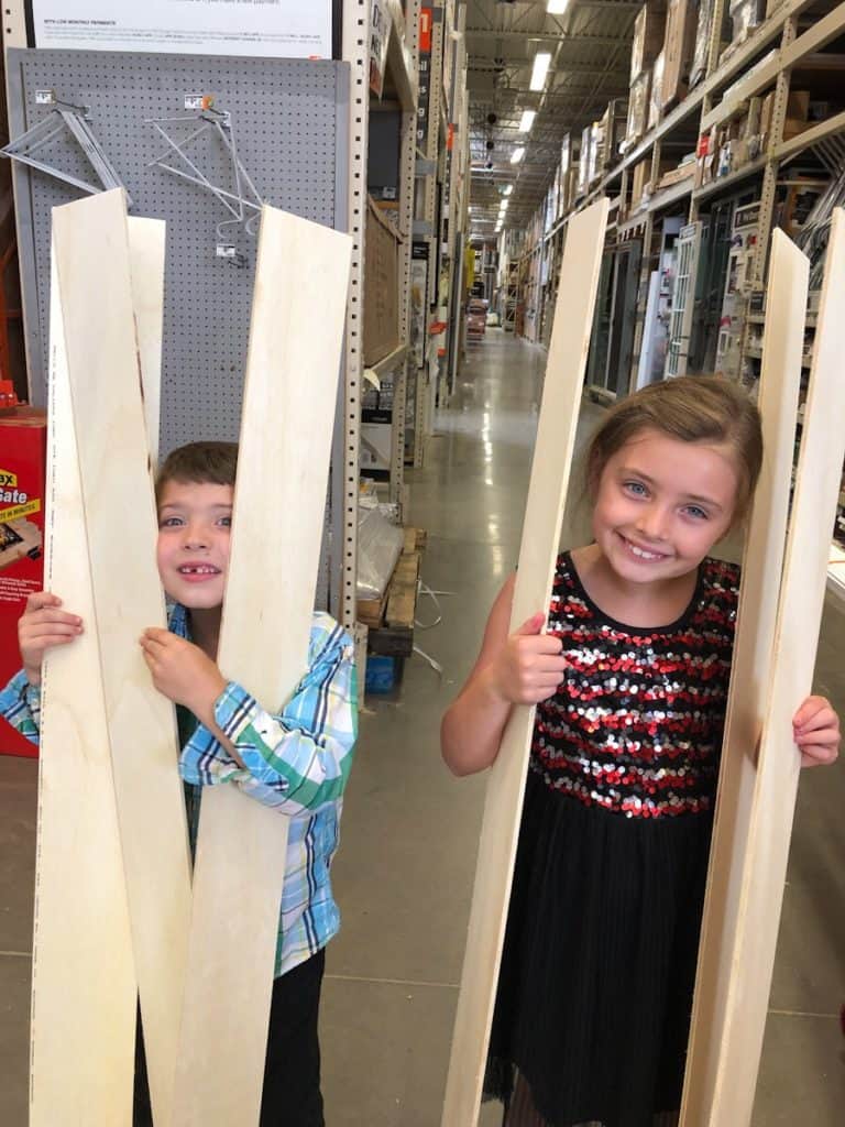 kids with shiplap boards