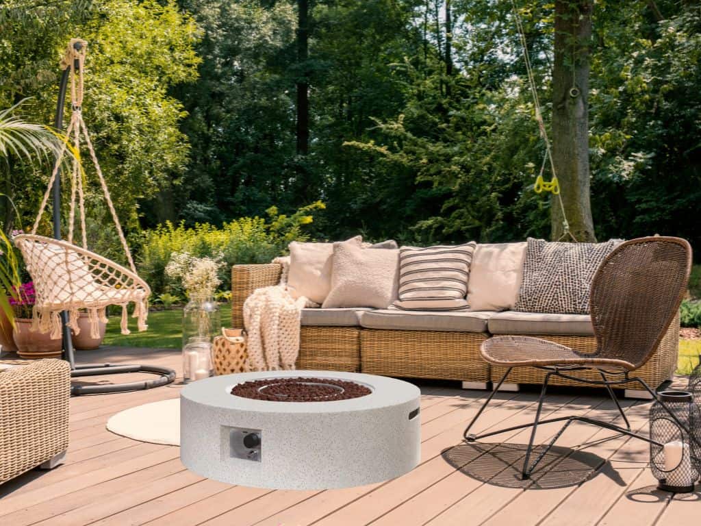Terrazzo fire pit surrounded by patio furniture