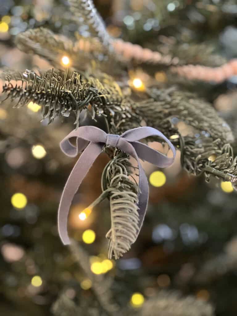 blue velvet bow on Christmas tree