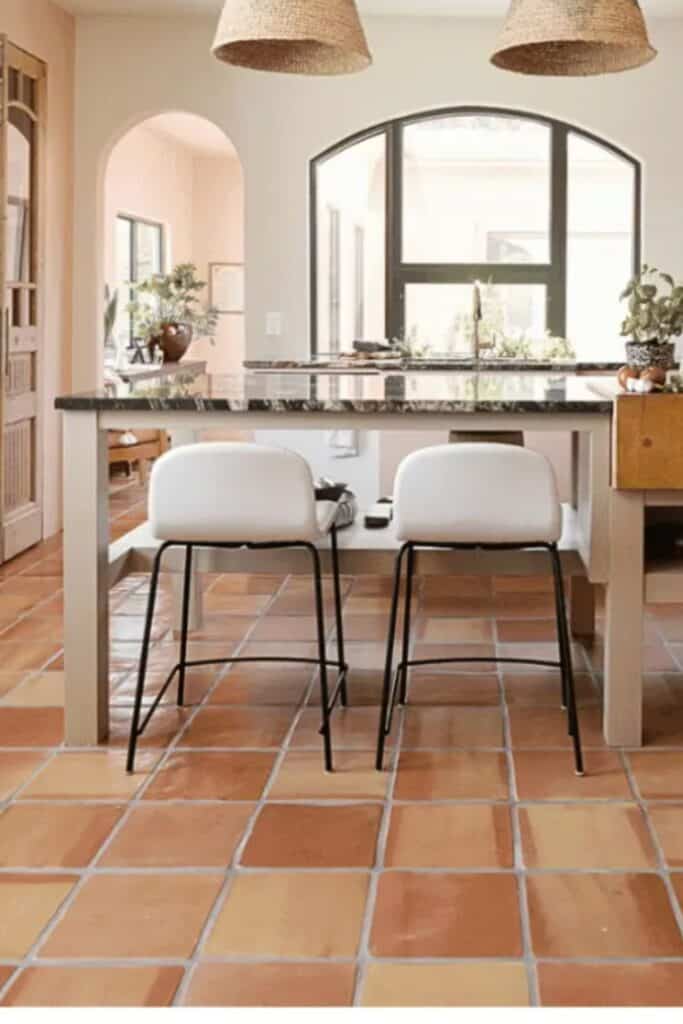 Modern kitchen with Mexican handmade tile flooring.