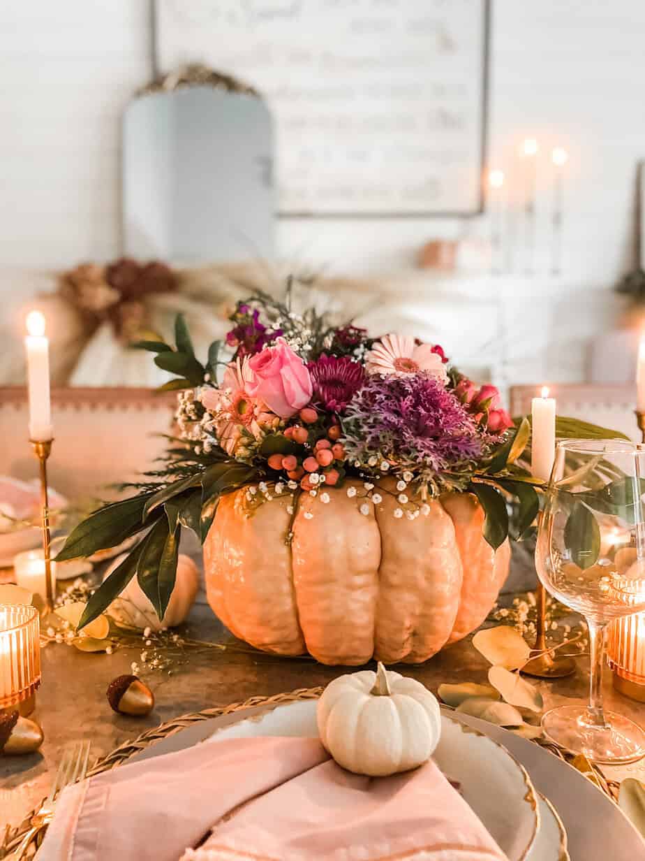 floral arrangement with real pumpkin vase