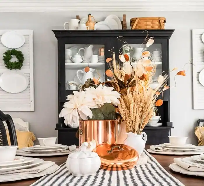 Fall floral centerpiece using copper bowls and wheat stalks